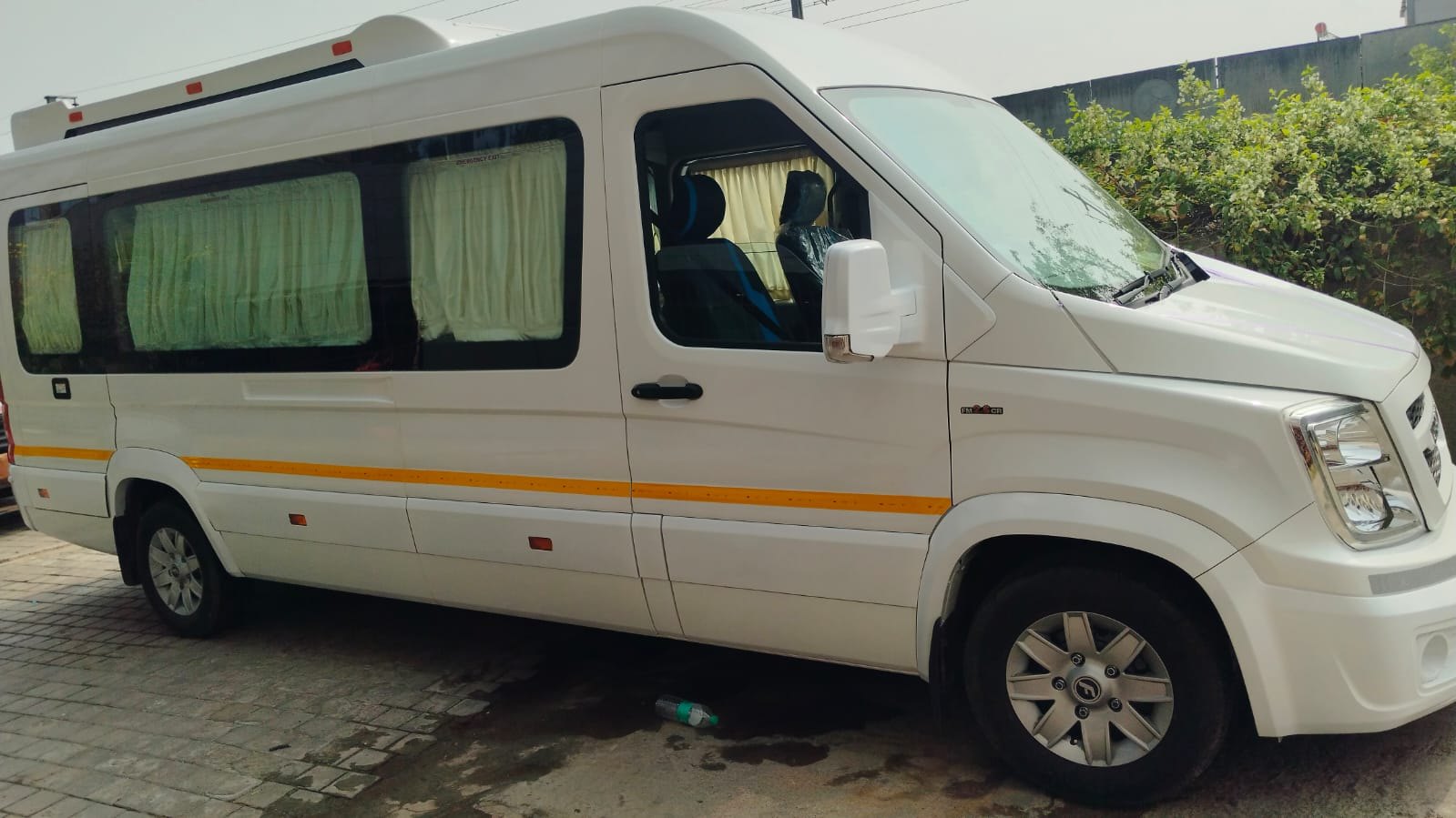 White Force Urbania luxury van seen from the side with curtained windows