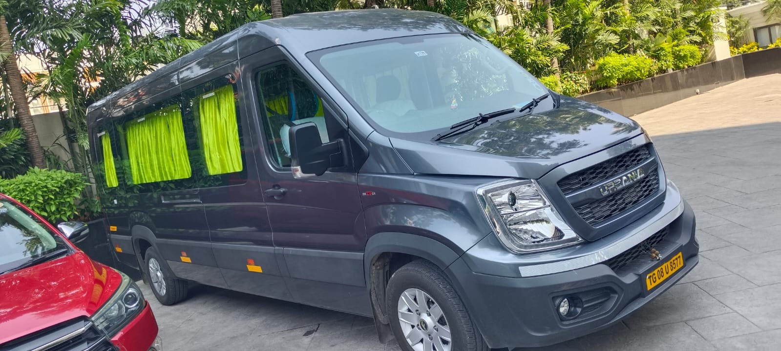 Grey Force Urbania executive van parked, front three-quarter view