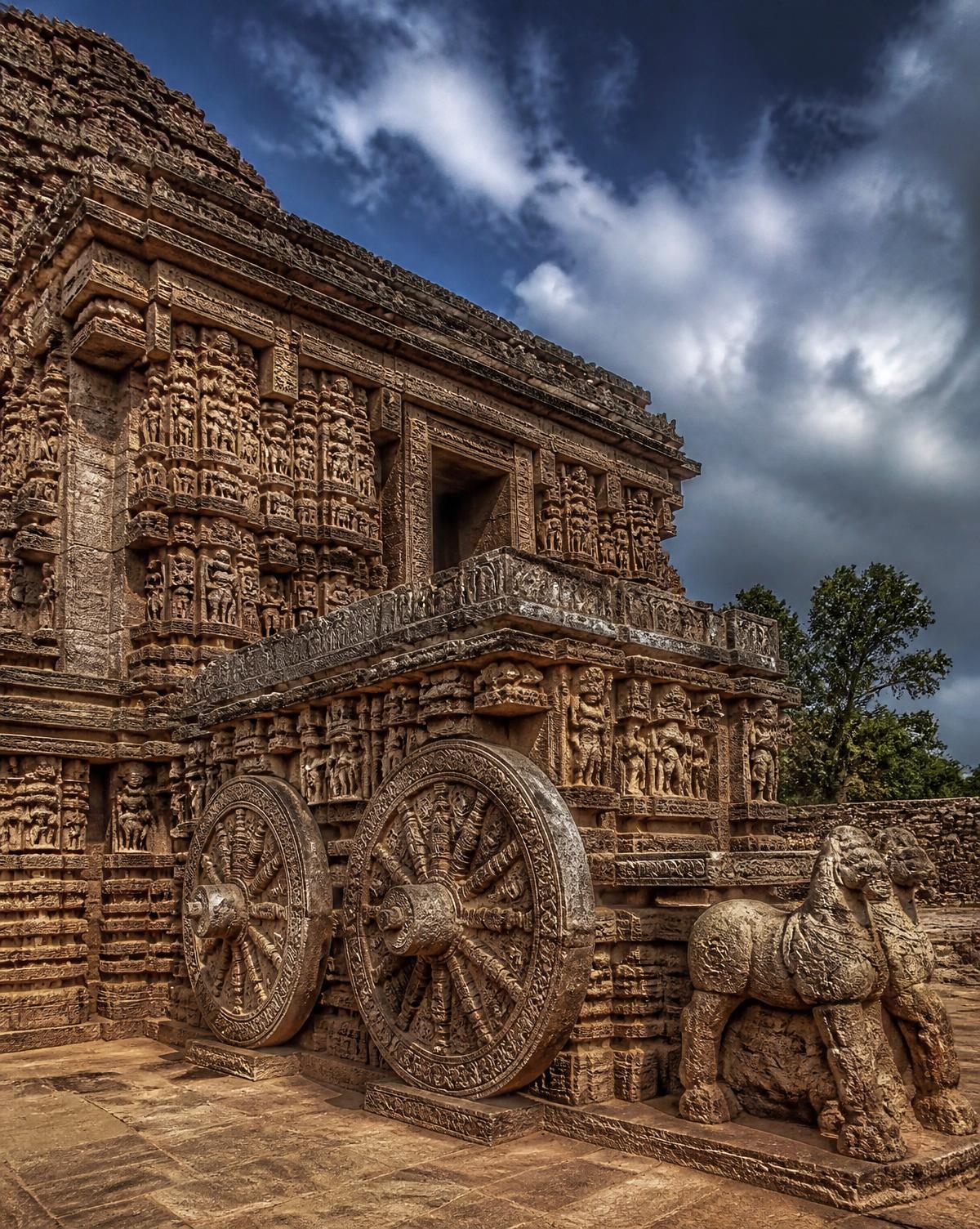 The carved stone chariot wheels of Konark Sun Temple, Odisha